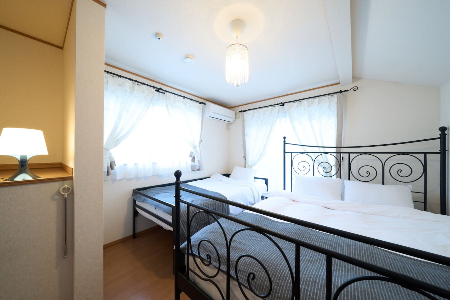 Bedroom with double and single beds